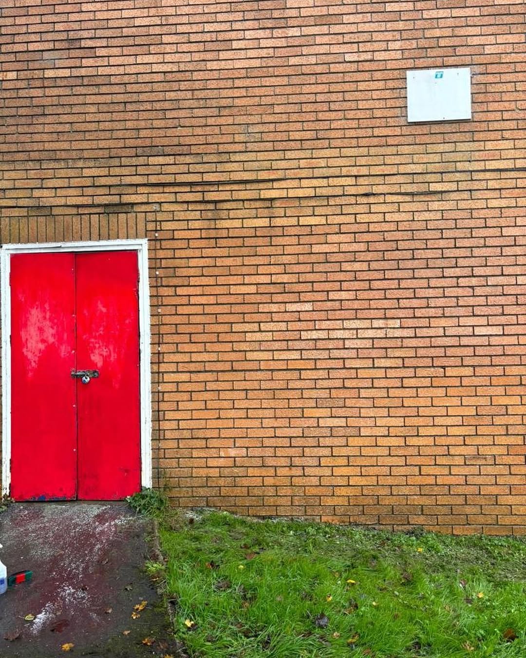 Clean brick wall after graffiti removal