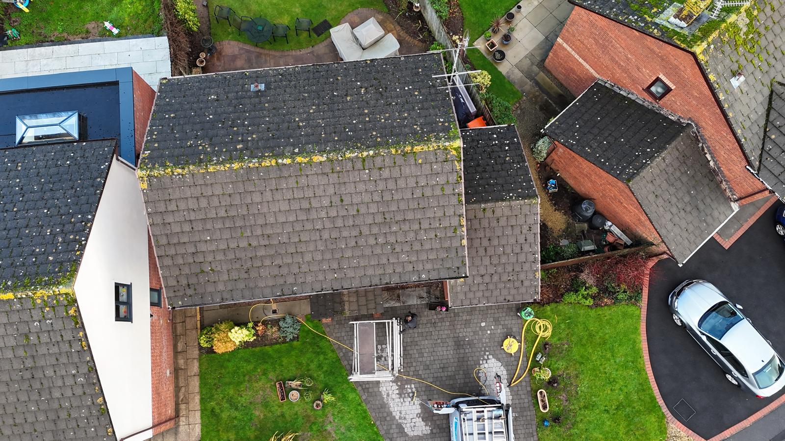 Mossy roof with lichen before cleaning